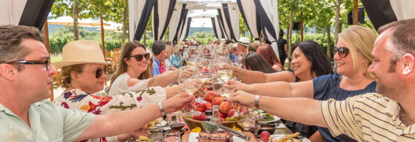 Guests enjoying wine tasting at 90 Plus Wine Club during 2018 Festival Napa Valley.